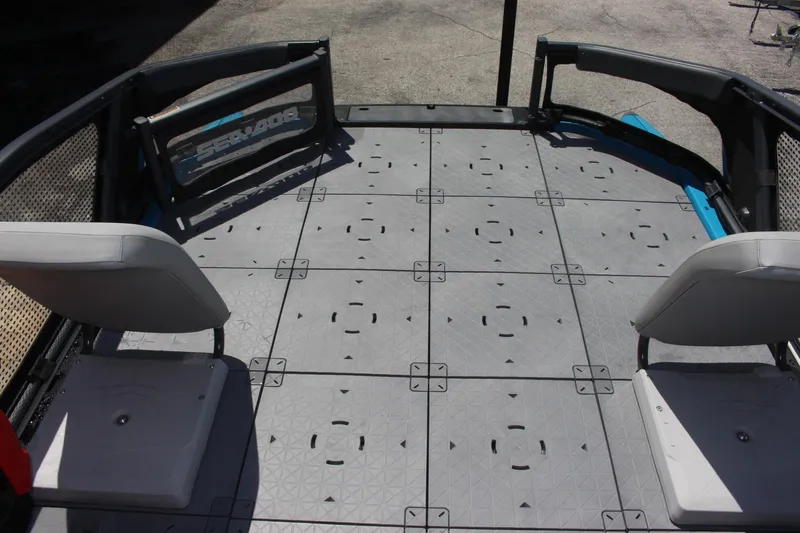 Slide: The Image of 2023 Sea-Doo Switch Sport 21 - 230 HP deck with seating and modular floor tiles. - 7