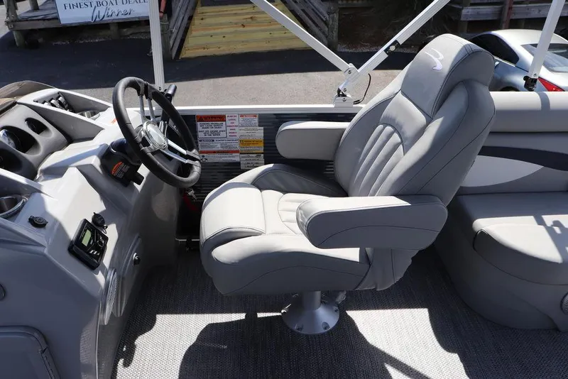Slide: The Image of 2024 Bennington 21 SSR boat captain's chair and helm station. - 11