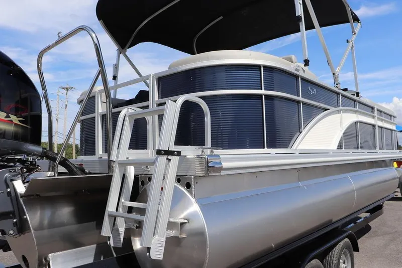 Slide: The Image of 2024 Bennington 21 SSR pontoon boat with ladder and canopy. - 12