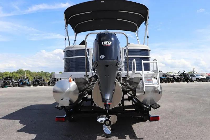 Slide: The Image of 2024 Bennington 21 SSR pontoon boat with 150 HP engine, rear view. - 14