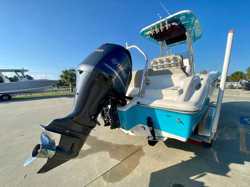 Slide: The Image of 2023 Key West 239 FS boat with Yamaha outboard motor on trailer. - 4