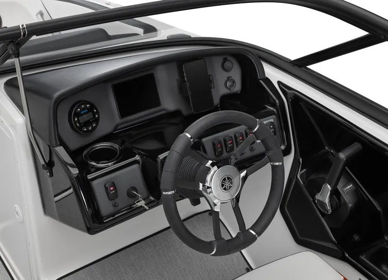 Slide: The Image of 2024 Yamaha Boats AR195 dashboard and steering wheel. - 2
