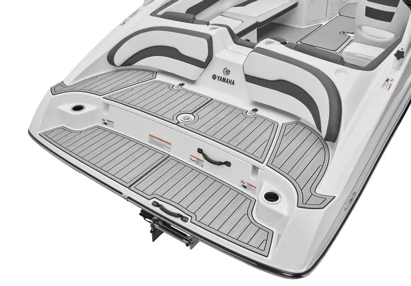 Slide: The Image of 2024 Yamaha Boats AR195 rear deck and seating area. - 6
