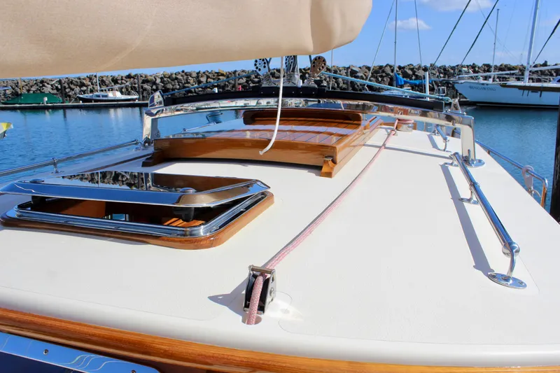 Slide: The Image of Cape George 45 sailboat deck, 2018 model, docked in a marina with clear skies. - 21