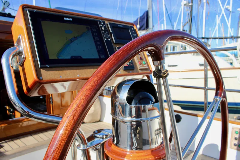 Slide: The Image of Steering wheel and navigation system on a 2018 Cape George 45 sailboat. - 25