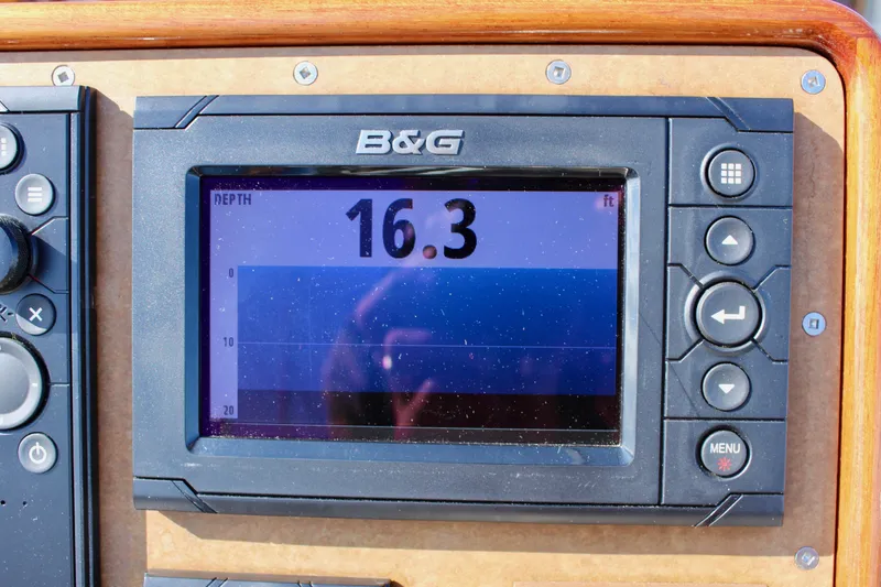 Slide: The Image of B&G marine depth gauge displaying 16.3 feet on a 2018 Cape George 45 sailboat. - 32