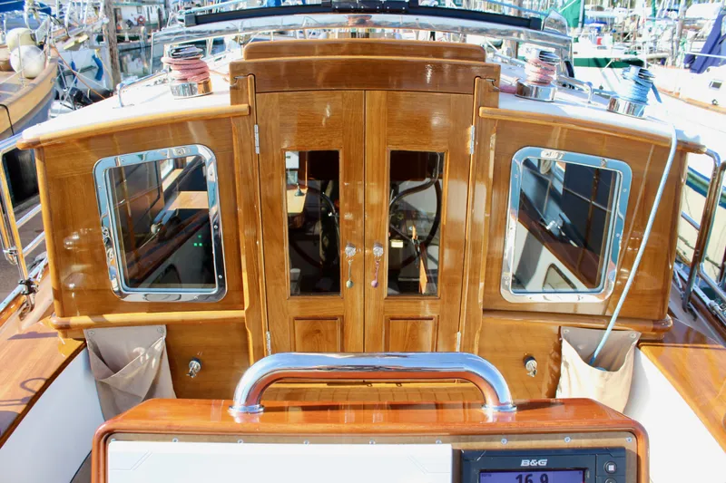 Slide: The Image of Cape George 45 sailboat cockpit with polished wood finish, 2018 model. - 40