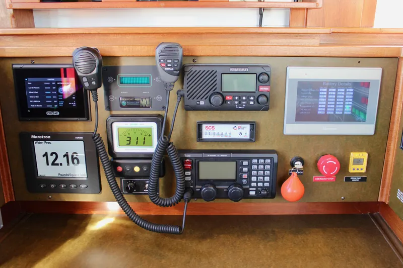 Slide: The Image of Control panel of a 2018 Cape George 45 sailboat with navigation and communication equipment. - 46
