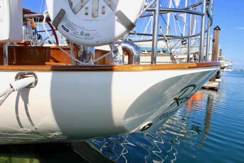 Slide: The Image of Cape George 45 sailboat, 2018 model, docked in a marina with clear blue water. - 8