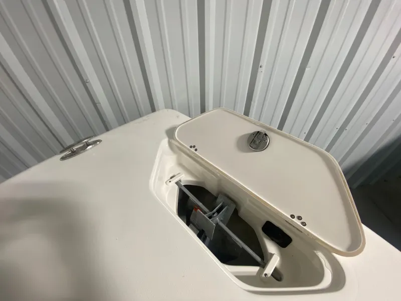 Slide: The Image of 2024 Key West 239 DFS boat anchor storage compartment. - 27