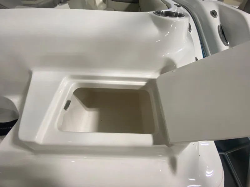 Slide: The Image of 2024 Key West 239 DFS boat storage compartment with open lid. - 30