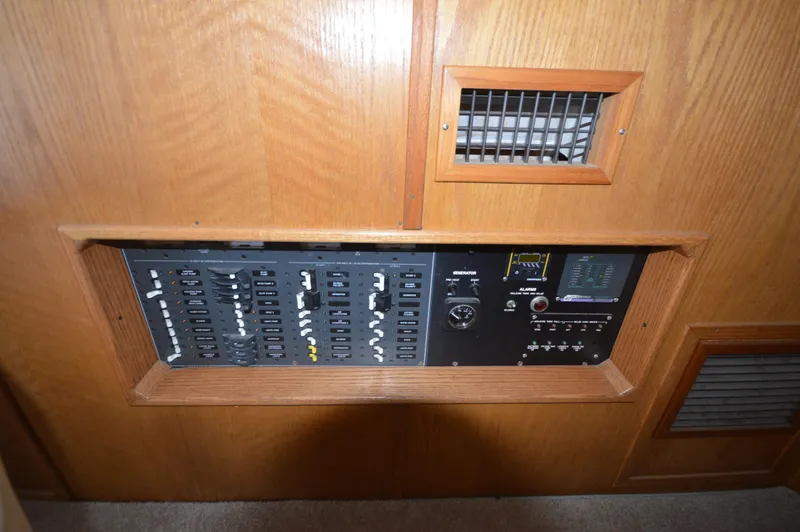Slide: The Image of Electrical control panel of a 1973 Hatteras 45 Convertible boat. - 19