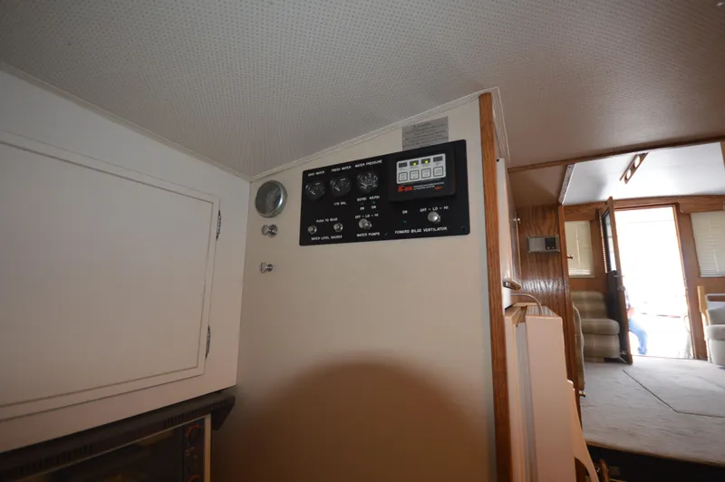 Slide: The Image of Interior control panel of a 1973 Hatteras 45 Convertible yacht. - 23