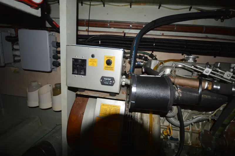 Slide: The Image of Engine room of a 1973 Hatteras 45 Convertible yacht showing electrical components. - 31