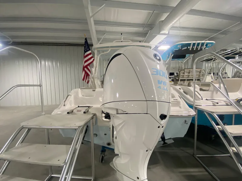 Slide: The Image of 2024 Key West 239 DFS boat with 300 HP Yamaha outboard engine in showroom. - 3