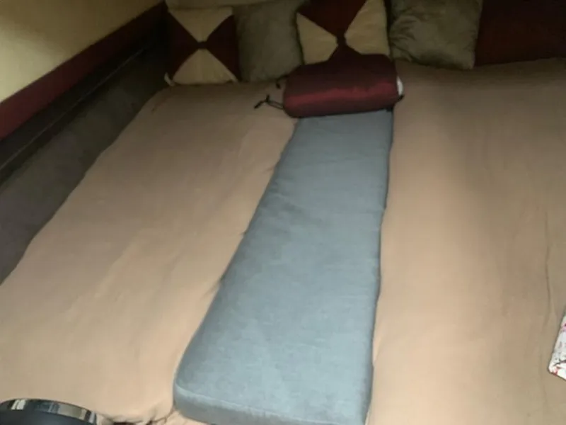 Slide: The Image of Interior of a 2008 Marquis 40 SC with cozy cushions. - 16