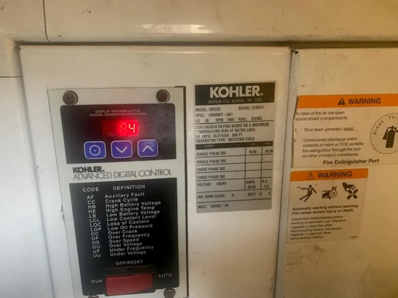 Slide: The Image of Kohler control panel with warning labels, Marquis 40 SC 2008. - 19