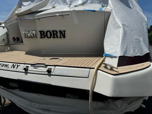 Slide: The Image of Rear view of a 2008 Marquis 40 SC yacht, partially covered. - 23