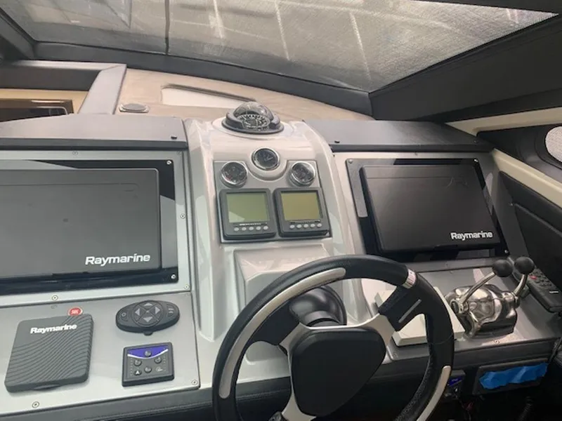 Slide: The Image of Helm of a 2008 Marquis 40 SC with Raymarine electronics. - 3