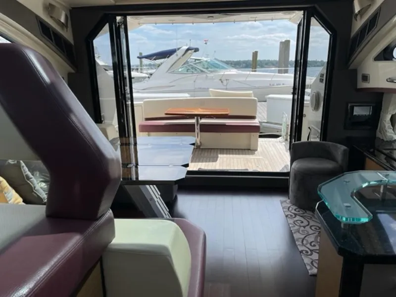 Slide: The Image of Interior of a 2008 Marquis 40 SC yacht with view of the deck. - 5