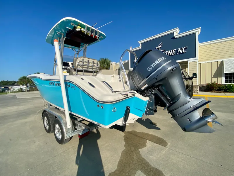 Slide: The Image of 2023 Key West 239 FS boat with Yamaha outboard motor on trailer. - 3
