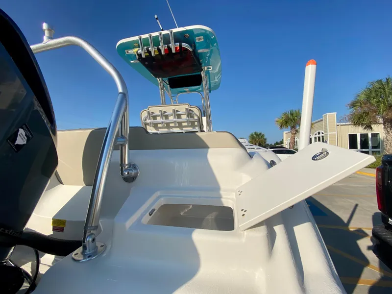Slide: The Image of 2023 Key West 239 FS boat with open storage compartment and T-top. - 5