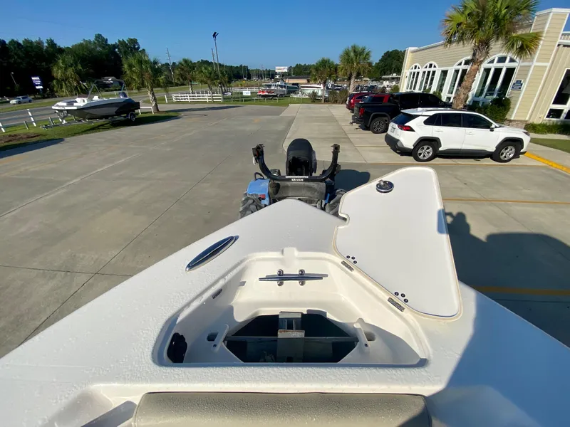Slide: The Image of 2023 Key West 239 FS boat on trailer in parking lot. - 24