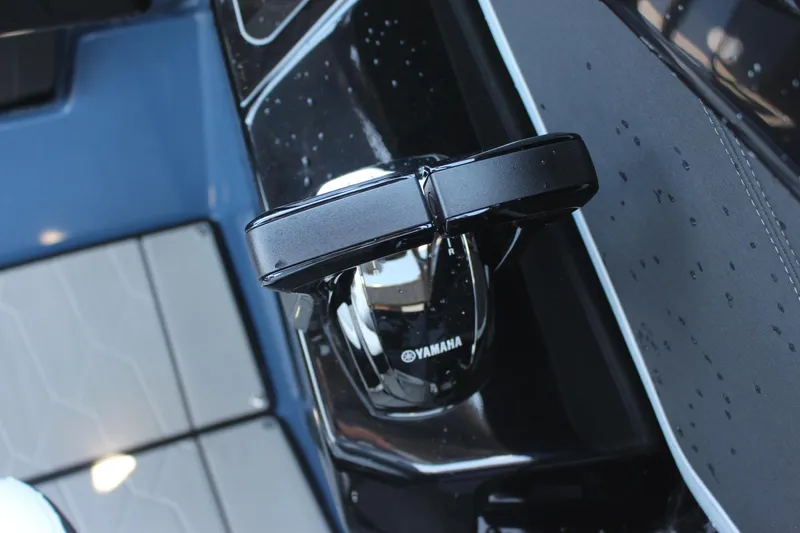 Slide: The Image of Close-up of 2023 Yamaha Boats 255XD control lever. - 13