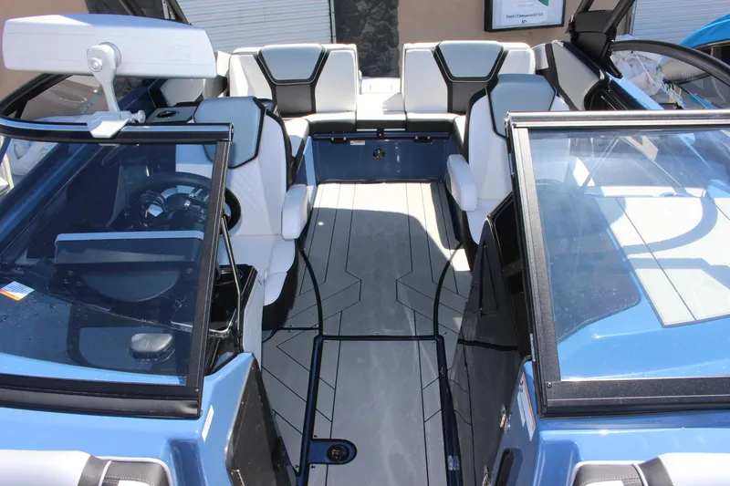 Slide: The Image of 2023 Yamaha Boats 255XD interior, featuring modern seating and sleek design. - 6