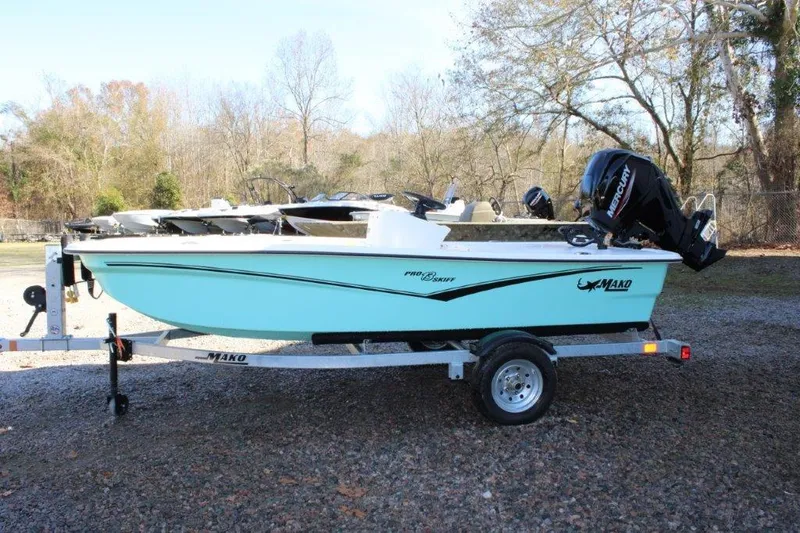 The Image of 2024 Mako Pro Skiff 13 CC on trailer, side view, outdoors. - 0