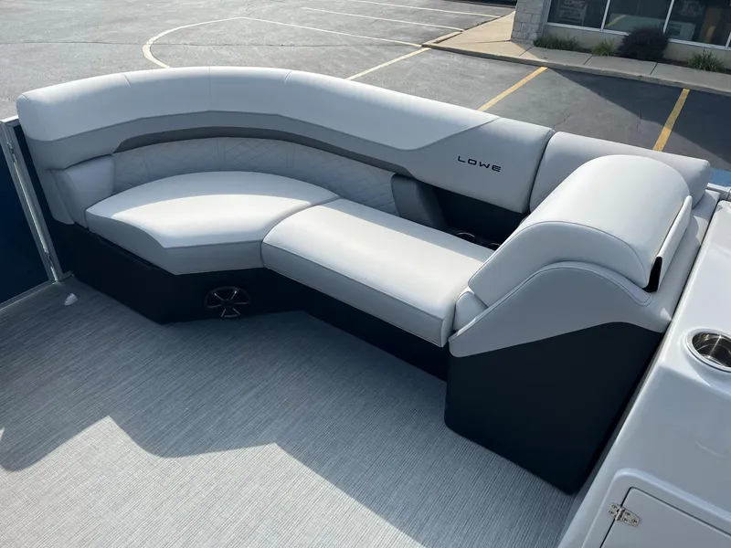 Slide: The Image of 2024 Lowe SS 210 WT boat interior with gray seating. - 14