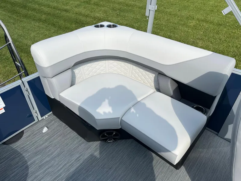 Slide: The Image of 2024 Lowe SS 210 WT pontoon boat with white and gray cushioned seating. - 18