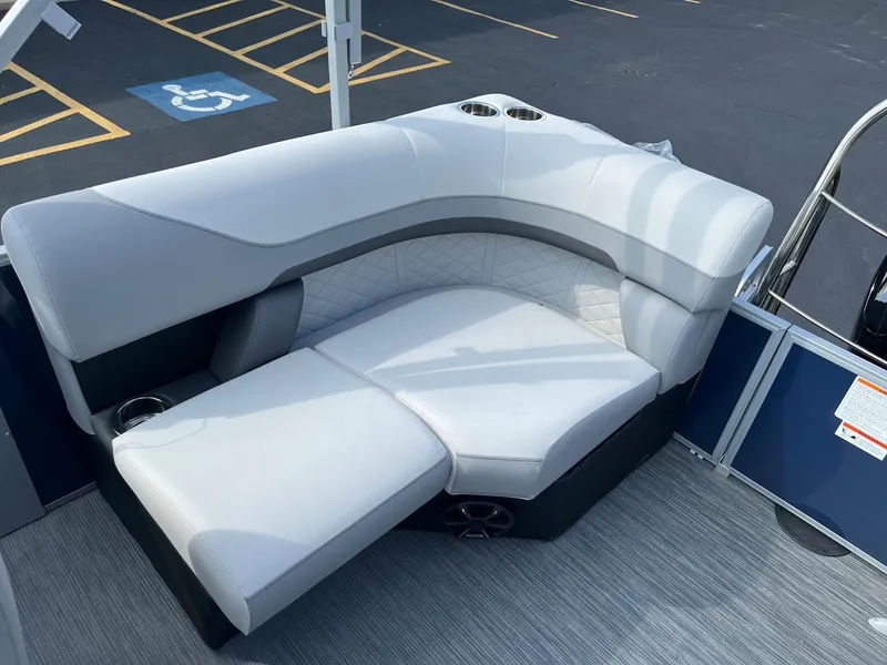 Slide: The Image of 2024 Lowe SS 210 WT pontoon boat with luxurious seating. - 19
