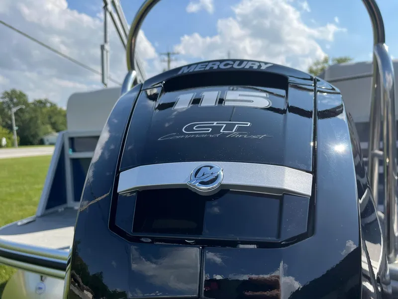 Slide: The Image of Close-up of a 2024 Lowe SS 210 WT boat with a Mercury 115 CT engine. - 29