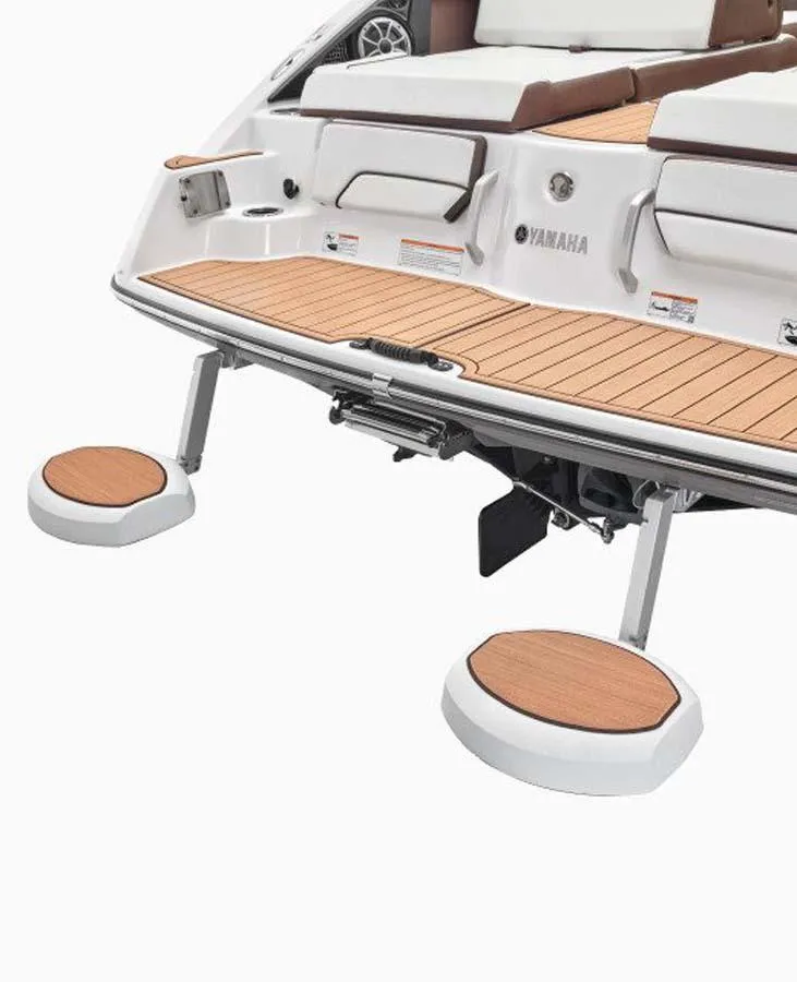 Slide: The Image of 2023 Yamaha Boats 252SD swim platform with teak-style decking and seating. - 11