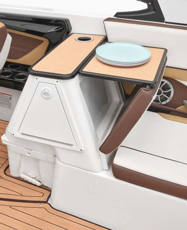 Slide: The Image of 2023 Yamaha Boats 252SD interior with table and seating area. - 9