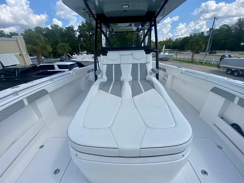 Slide: The Image of 2022 Invincible 35 Catamaran with spacious deck and comfortable seating. - 33