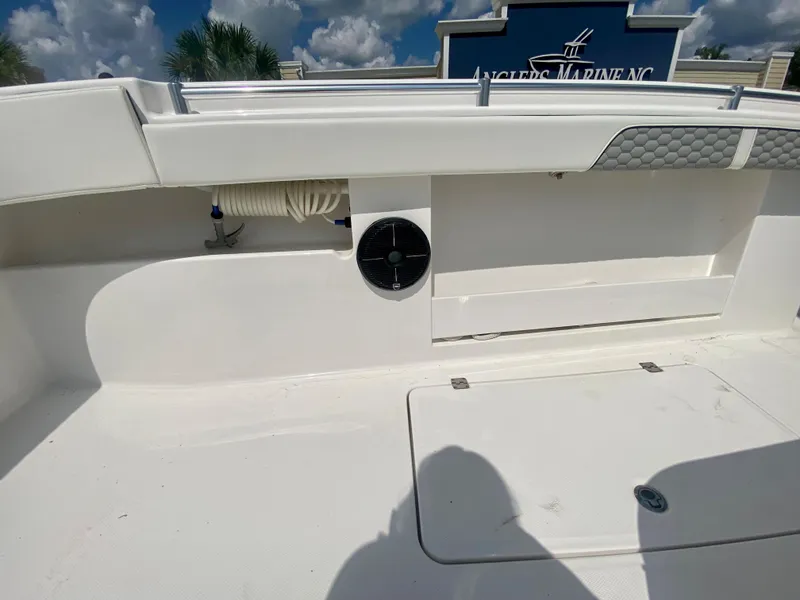 Slide: The Image of 2022 Invincible 35 Catamaran deck with storage compartment and speaker. - 36