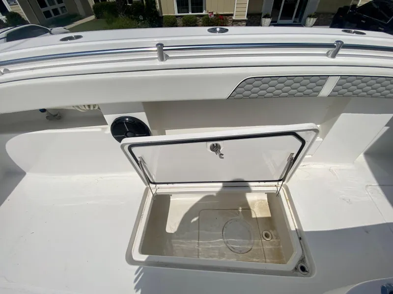 Slide: The Image of 2022 Invincible 35 Catamaran open storage compartment on deck. - 42