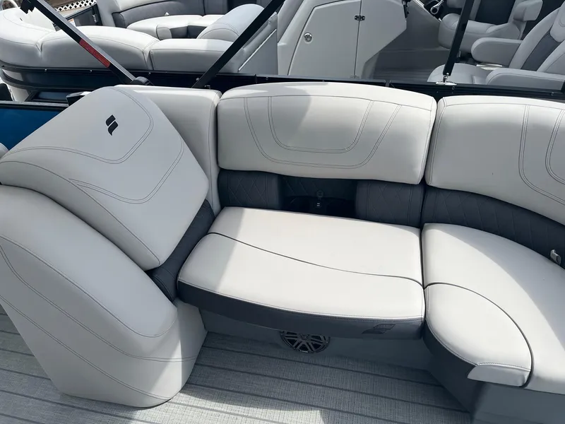 Slide: The Image of 2024 Starcraft SLS 3 boat with luxurious white seating. - 10