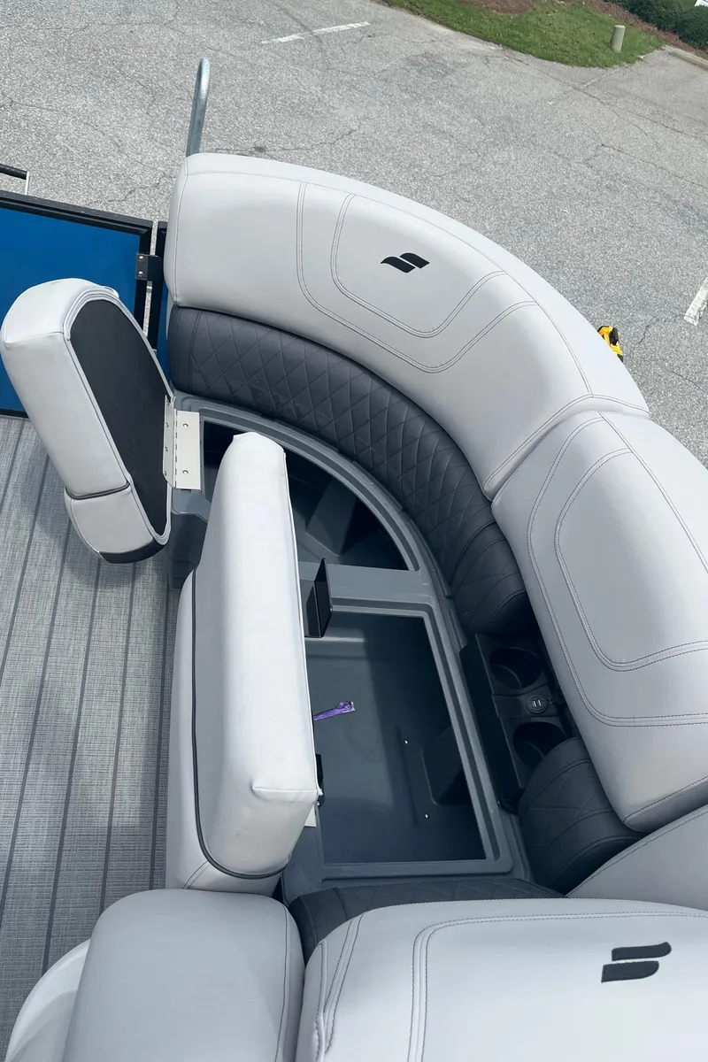 Slide: The Image of 2024 Starcraft SLS 3 boat interior with gray seating and storage compartment. - 19