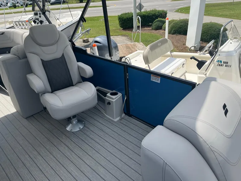 Slide: The Image of 2024 Starcraft SLS 3 boat interior with comfortable seating and modern design. - 7
