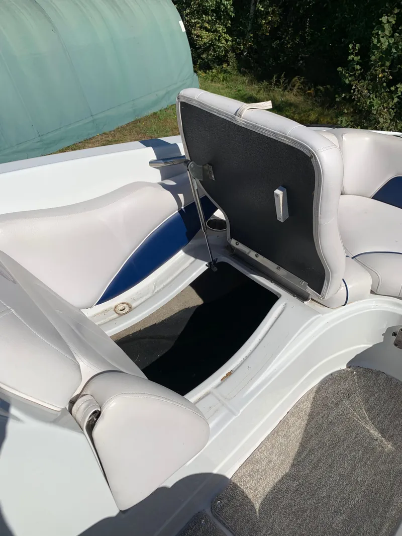 Slide: The Image of 2012 Crownline E6 boat interior seating and storage compartment. - 47