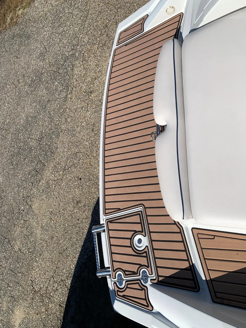 Slide: The Image of 2012 Crownline E6 boat with teak-style swim platform. - 7