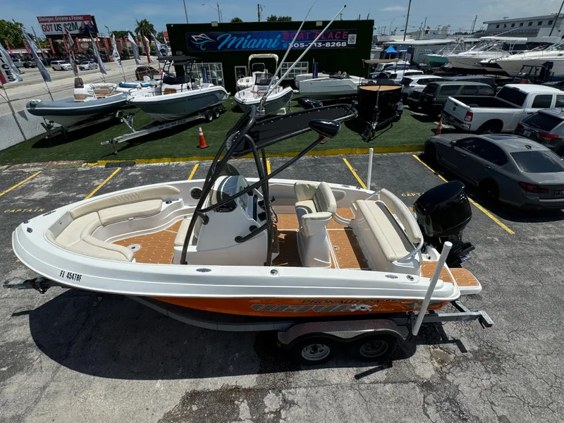 Slide: The Image of 2016 Pronautica 660 boat on trailer at Miami boat dealership. - 43