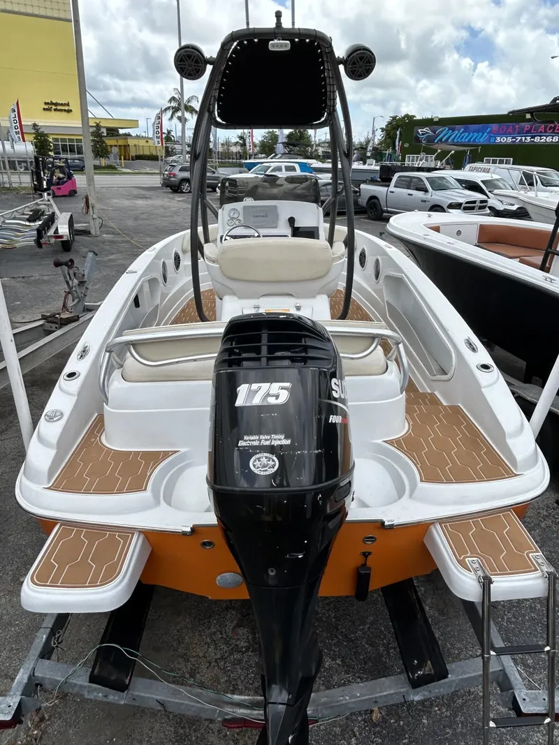 Slide: The Image of 2016 Pronautica 660 boat with Suzuki 175 outboard motor on display. - 8