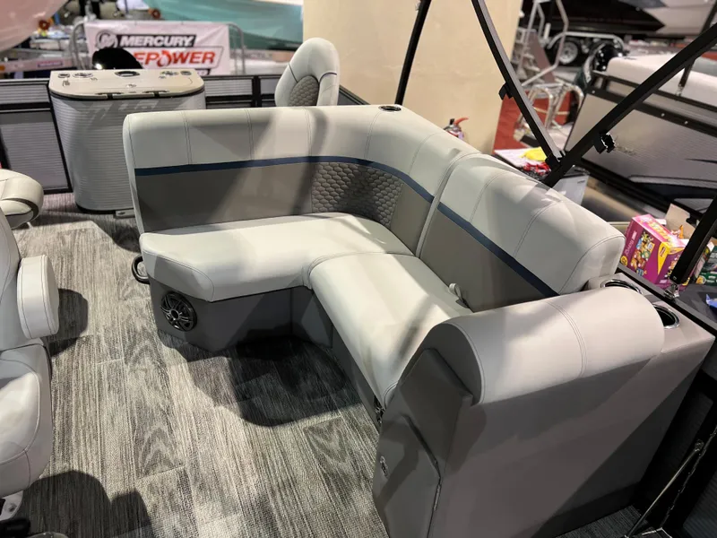 Slide: The Image of 2024 Qwest XRE 820 boat interior with gray cushioned seating. - 19