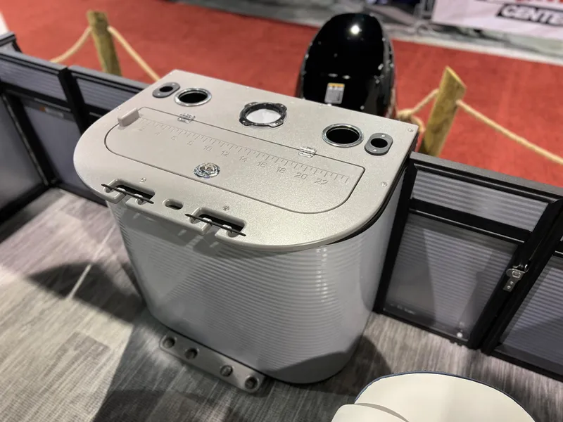 Slide: The Image of 2024 Qwest XRE 820 boat console with cup holders and control panel. - 22