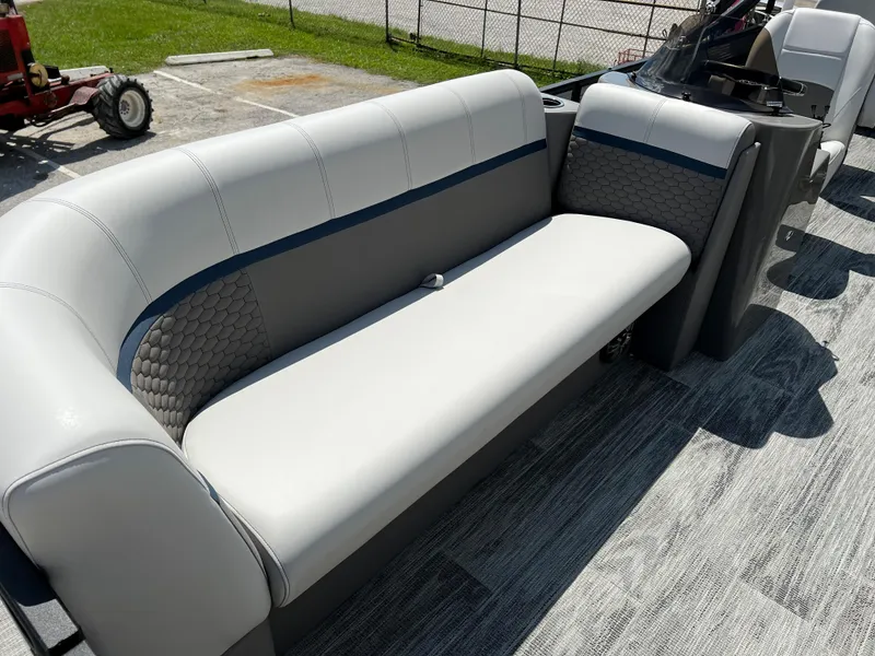 Slide: The Image of 2024 Qwest XRE 820 boat with comfortable seating and modern design. - 6