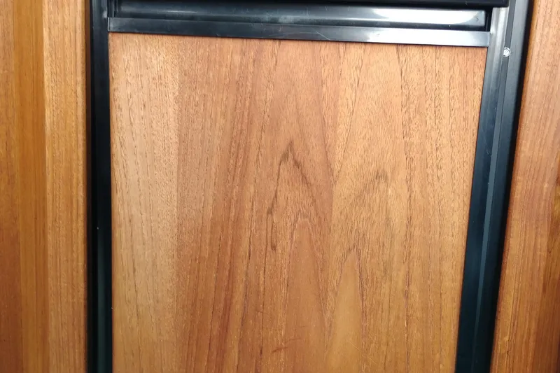 Slide: The Image of Wooden panel detail on a 1995 Bayliner 3988 Motoryacht interior. - 16